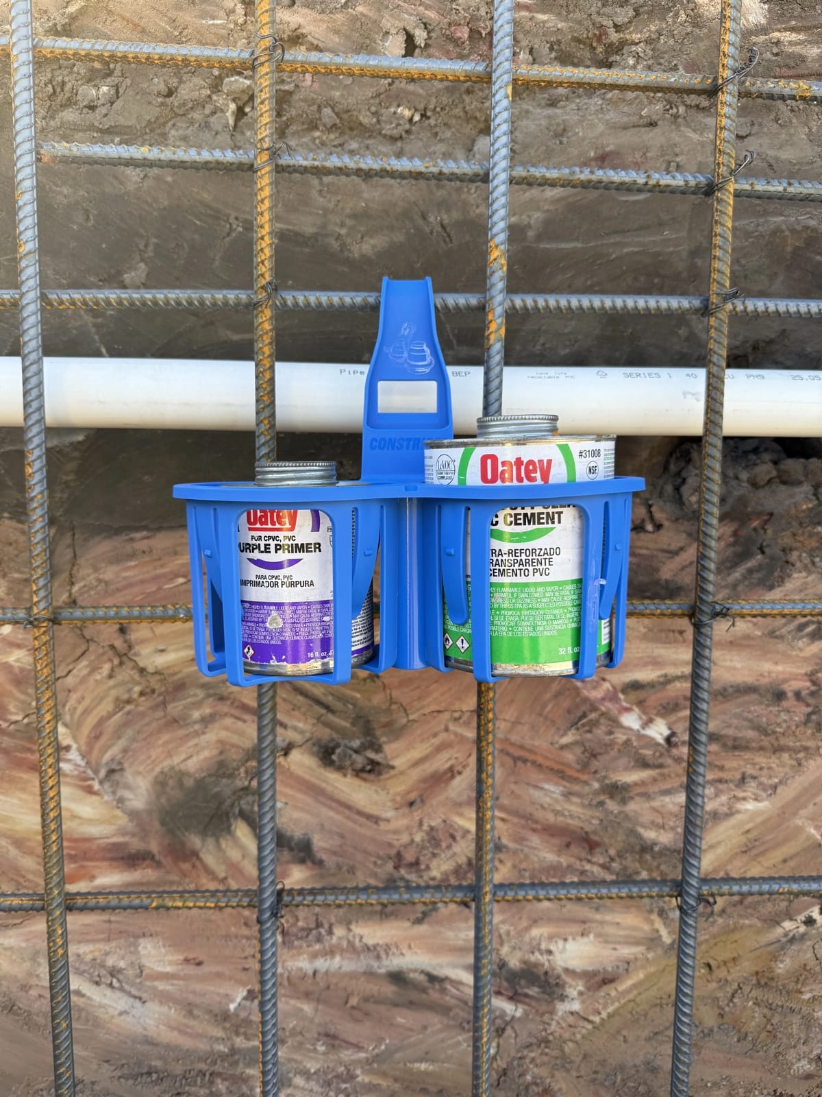 Blue Glue nd primer holder hanging on rio bar