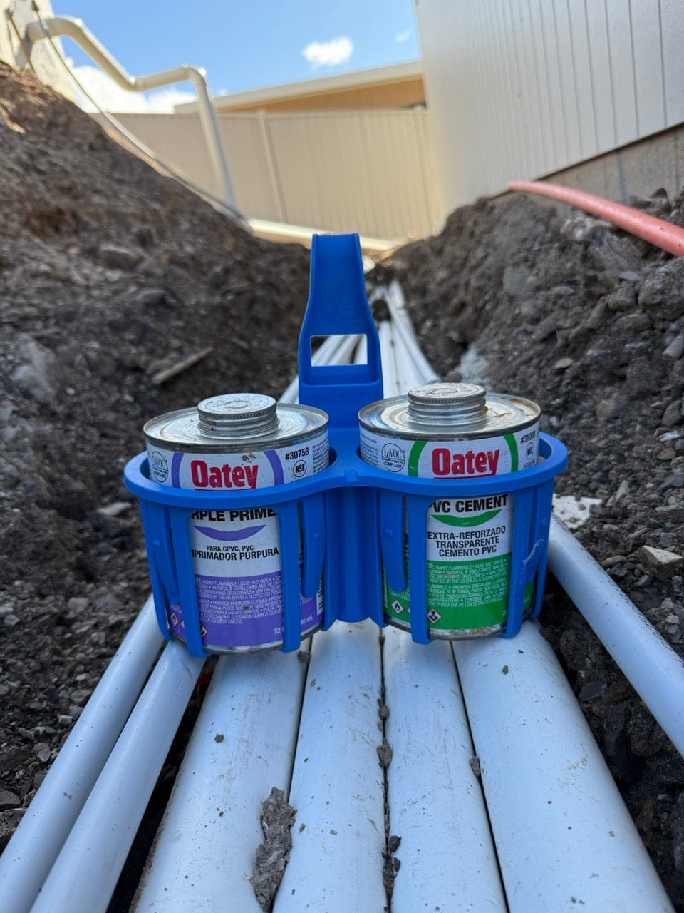 Blue constricta multi pot grip sitting on pvc pipes with glue and prmer in it
