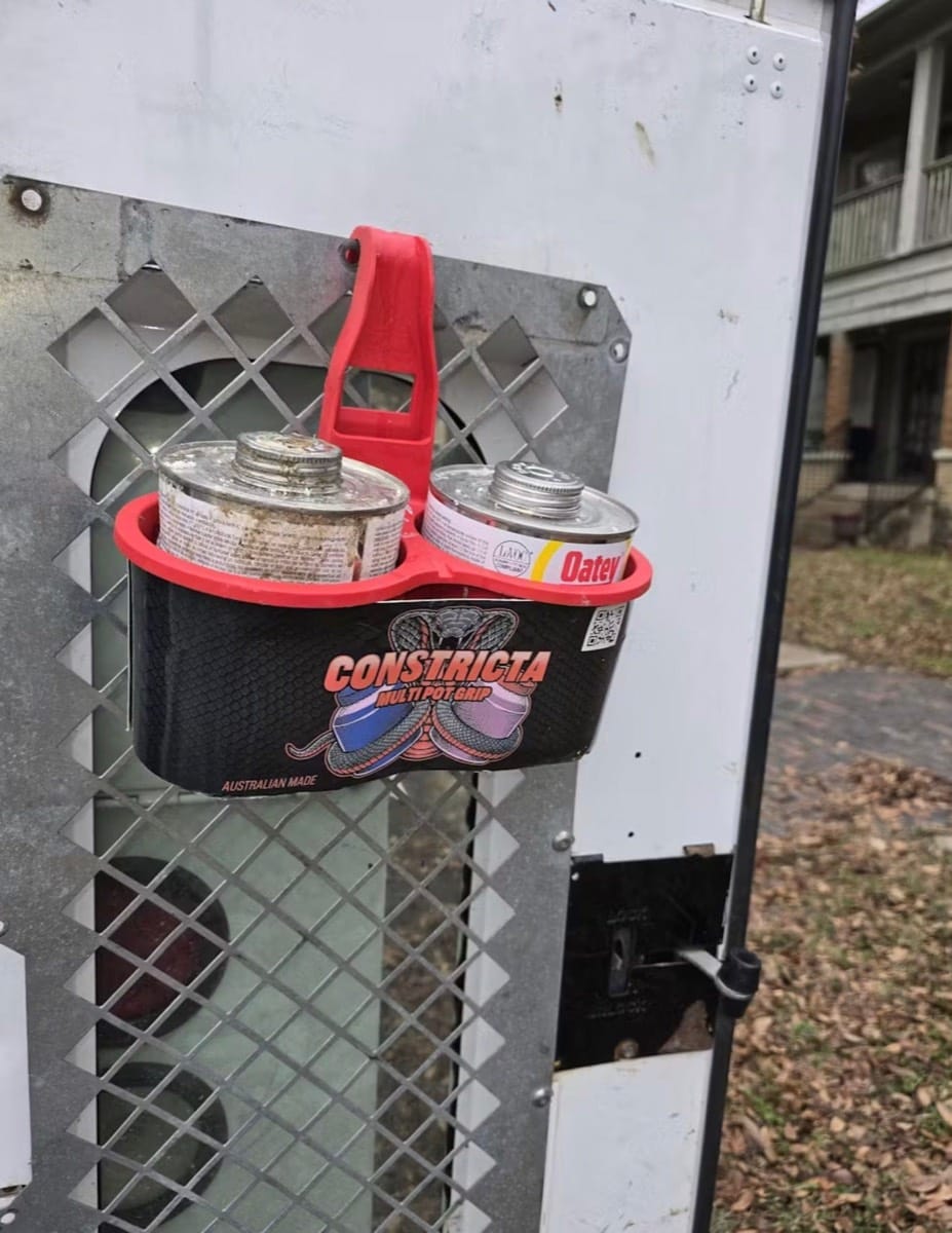 Constricta product holder with two canisters attached to a electrical cage  